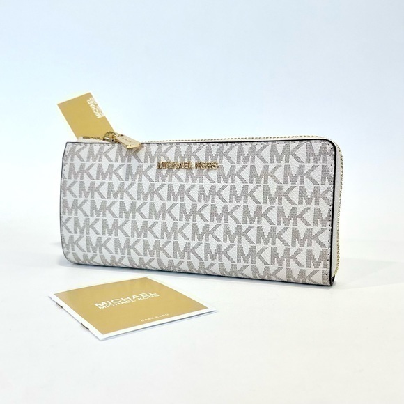 Michael Kors Handbags - MICHAEL KORS Jet Set Travel Large Logo Quarter-Zip Wallet Vanilla